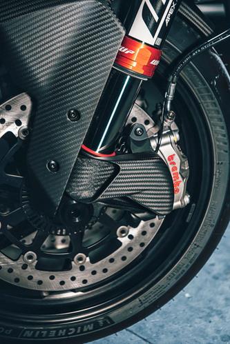 detailed photo of left side of bike with installed Carbon Fiber Brake Cooling Duct Kit for 2020-2024 KTM 1290 Super Duke