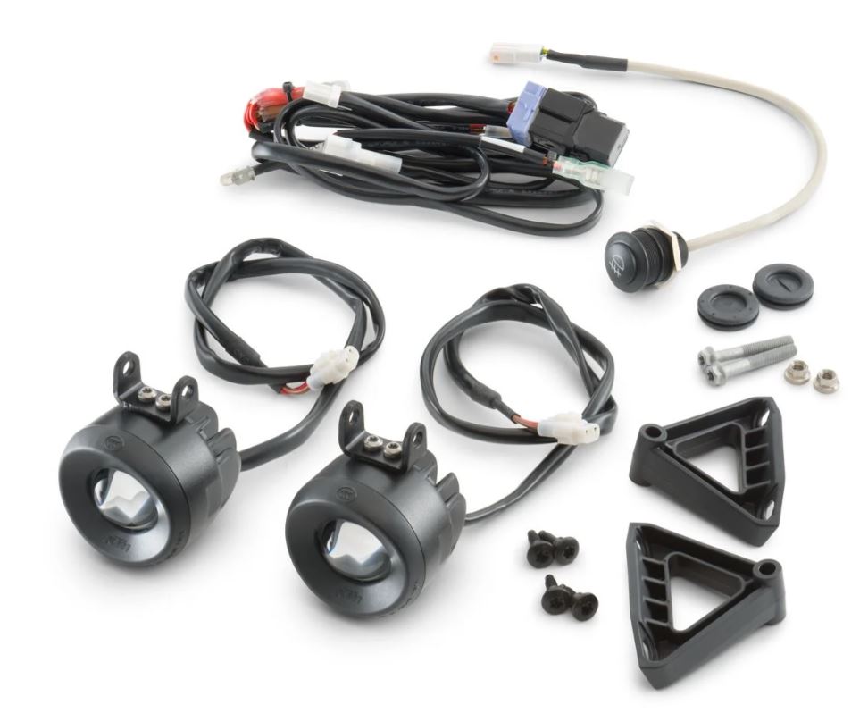 Detailed photo of uninstalled Auxiliary Lamp Kit showing all components of kit for 2022-2024 KTM 1290 Super Adventure