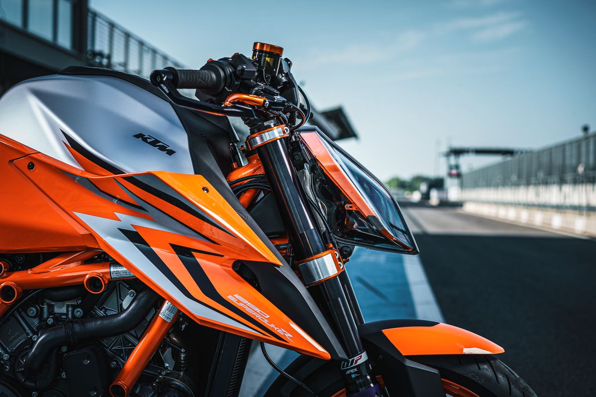 Detailed photo of right side of bike with installed Upper & Lower Triple Clamp Set in orange for 2020-2023 KTM 1290 Super Duke